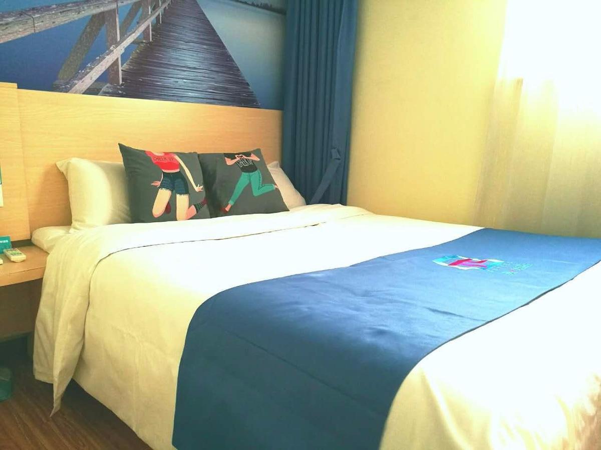 Pai Hotel Heze Dingtao Wantai City Bagian luar foto