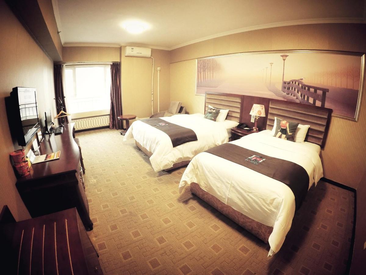 Pai Hotel Heze Dingtao Wantai City Bagian luar foto